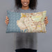 Person holding 20x12 Custom La Jolla California Map Throw Pillow in Woodblock
