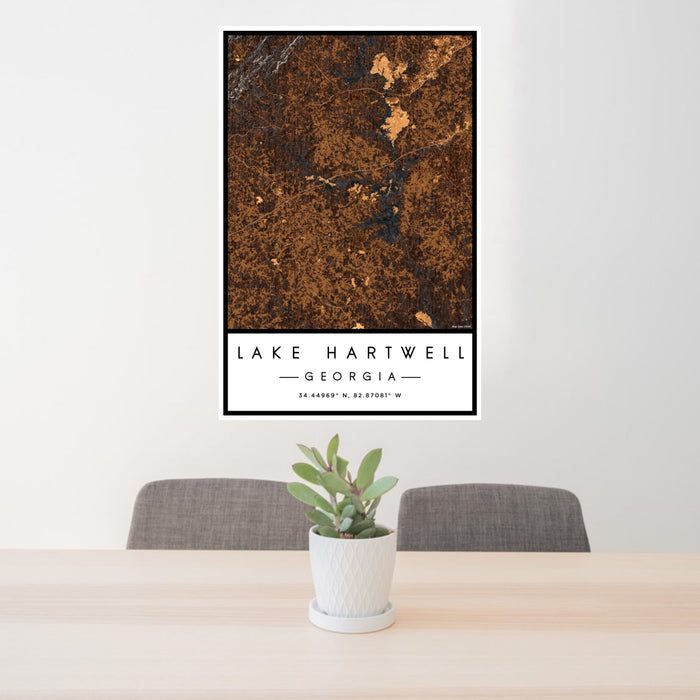 24x36 Lake Hartwell Georgia Map Print Portrait Orientation in Ember Style Behind 2 Chairs Table and Potted Plant