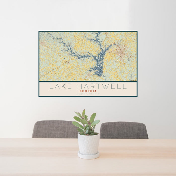 24x36 Lake Hartwell Georgia Map Print Lanscape Orientation in Woodblock Style Behind 2 Chairs Table and Potted Plant