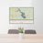 24x36 Lake Livingston Texas Map Print Lanscape Orientation in Woodblock Style Behind 2 Chairs Table and Potted Plant