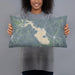 Person holding 20x12 Custom Lake Livingston Texas Map Throw Pillow in Afternoon