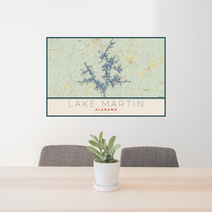 24x36 Lake Martin Alabama Map Print Lanscape Orientation in Woodblock Style Behind 2 Chairs Table and Potted Plant