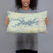 Person holding 20x12 Custom Lake Ouachita Arkansas Map Throw Pillow in Woodblock