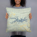 Person holding 18x18 Custom Lake Ouachita Arkansas Map Throw Pillow in Woodblock