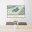 24x36 Lake Quinault Washington Map Print Lanscape Orientation in Woodblock Style Behind 2 Chairs Table and Potted Plant