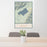 24x36 Lake Quinault Washington Map Print Portrait Orientation in Woodblock Style Behind 2 Chairs Table and Potted Plant