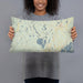 Person holding 20x12 Custom Lakes Region Maine Map Throw Pillow in Woodblock