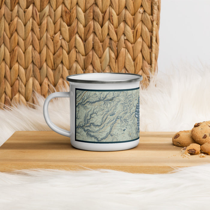 Left View Custom Lake Tahoe Sierra Nevada Map Enamel Mug in Woodblock on Table Top