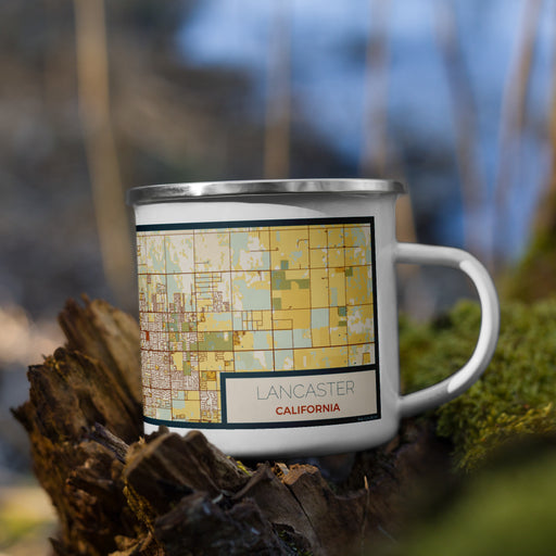 Right View Custom Lancaster California Map Enamel Mug in Woodblock on Grass With Trees in Background