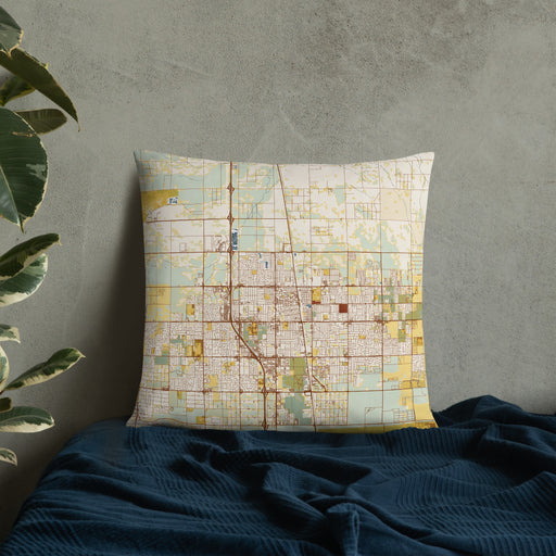 Custom Lancaster California Map Throw Pillow in Woodblock on Bedding Against Wall
