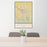 24x36 Lancaster Ohio Map Print Portrait Orientation in Woodblock Style Behind 2 Chairs Table and Potted Plant