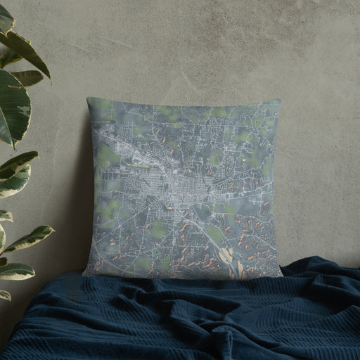 Custom Lancaster Ohio Map Throw Pillow in Afternoon on Bedding Against Wall