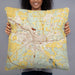 Person holding 22x22 Custom Lancaster Ohio Map Throw Pillow in Woodblock