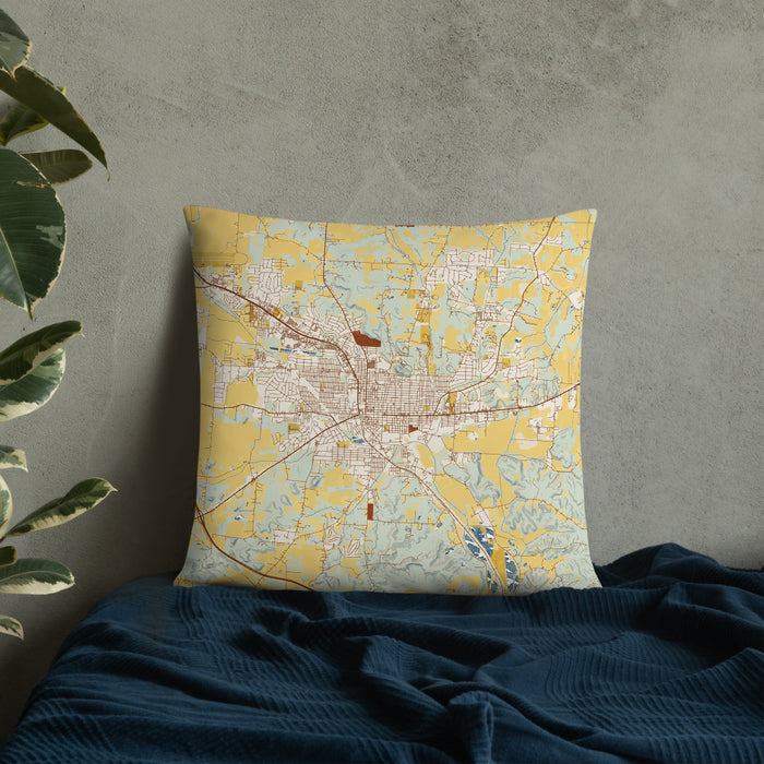 Custom Lancaster Ohio Map Throw Pillow in Woodblock on Bedding Against Wall