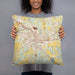 Person holding 18x18 Custom Lancaster Ohio Map Throw Pillow in Woodblock