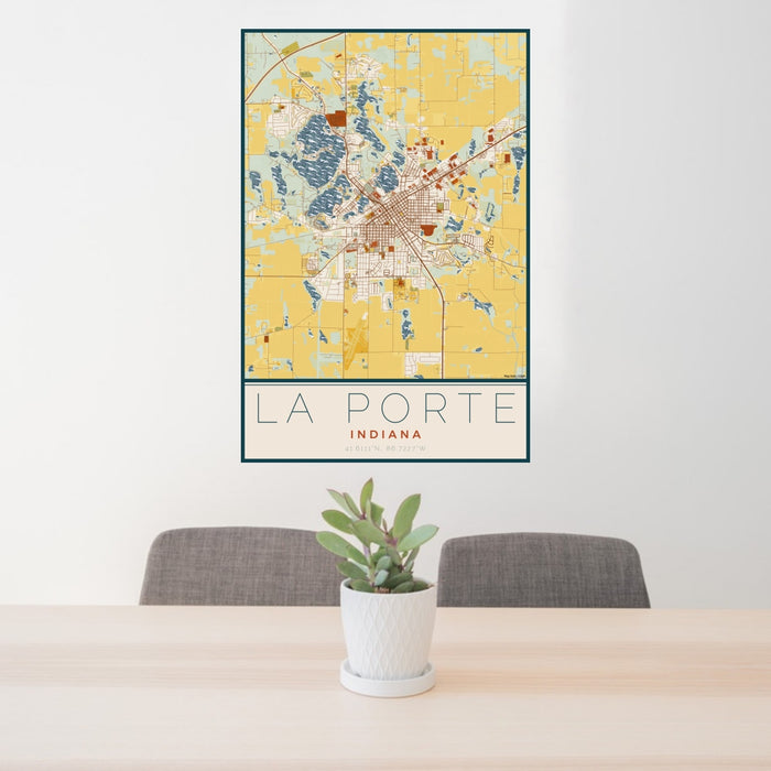 24x36 La Porte Indiana Map Print Portrait Orientation in Woodblock Style Behind 2 Chairs Table and Potted Plant