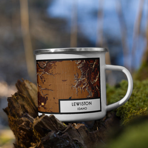 Right View Custom Lewiston Idaho Map Enamel Mug in Ember on Grass With Trees in Background