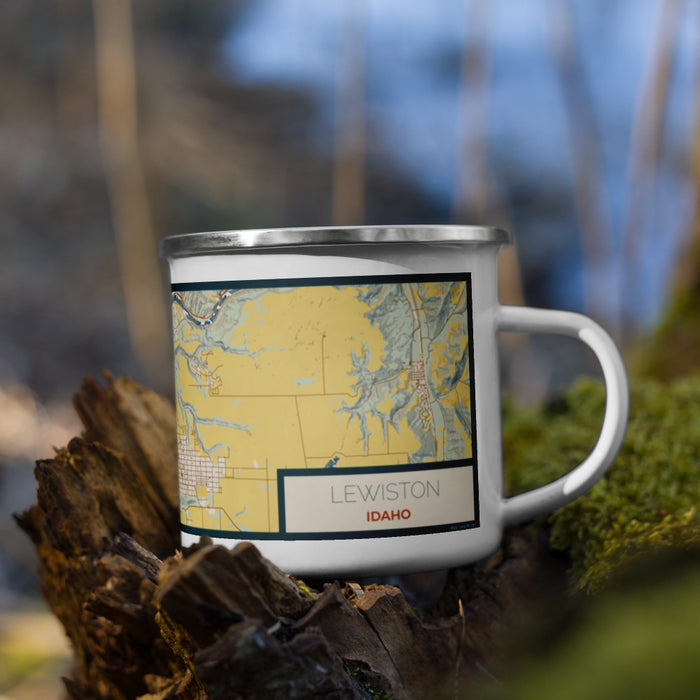 Right View Custom Lewiston Idaho Map Enamel Mug in Woodblock on Grass With Trees in Background