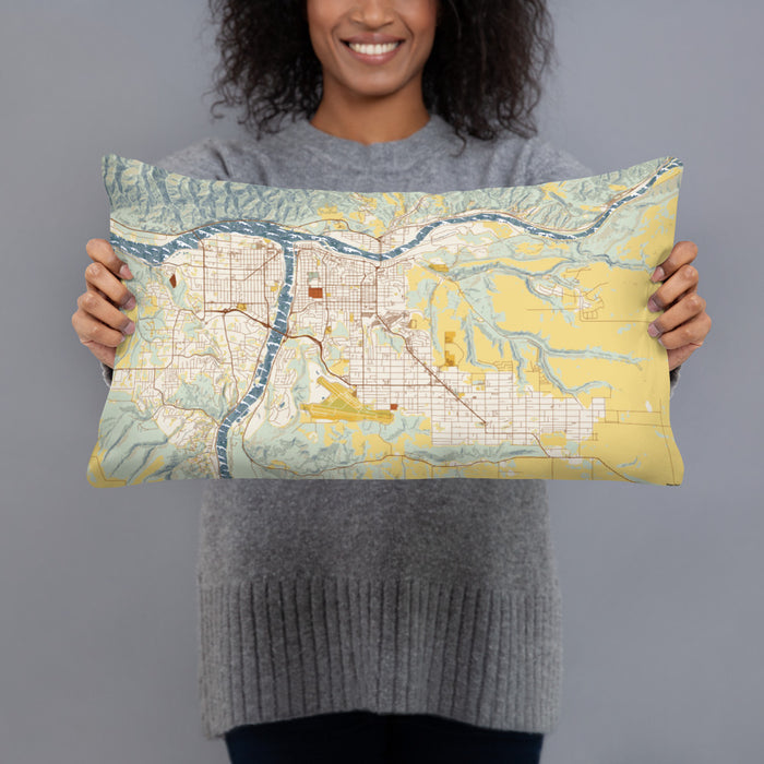 Person holding 20x12 Custom Lewiston Idaho Map Throw Pillow in Woodblock