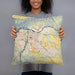 Person holding 18x18 Custom Lewiston Idaho Map Throw Pillow in Woodblock