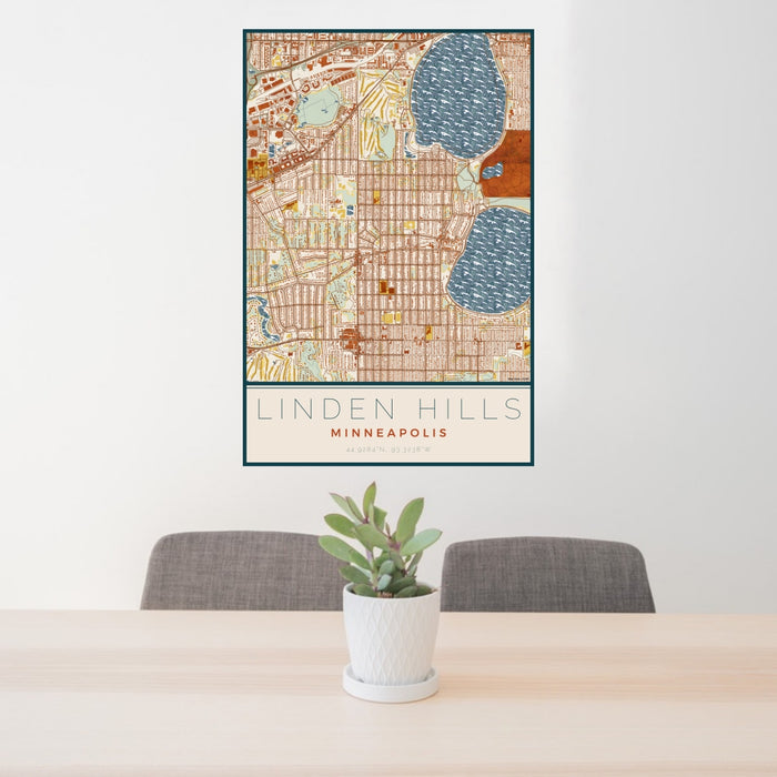 24x36 Linden Hills Minneapolis Map Print Portrait Orientation in Woodblock Style Behind 2 Chairs Table and Potted Plant