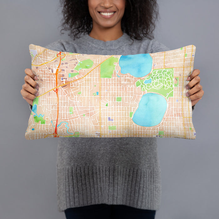 Person holding 20x12 Custom Linden Hills Minnesota Map Throw Pillow in Watercolor