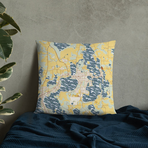 Custom Lindstrom Minnesota Map Throw Pillow in Woodblock on Bedding Against Wall