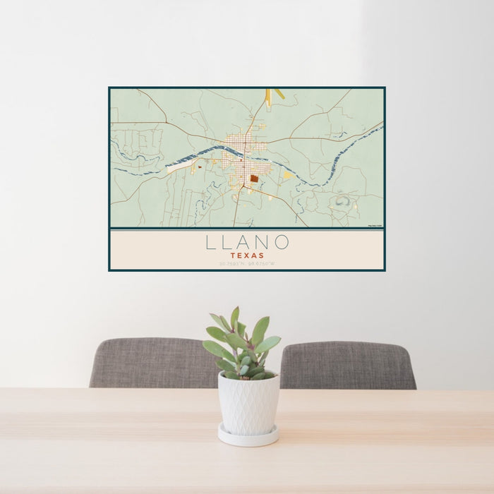 24x36 Llano Texas Map Print Lanscape Orientation in Woodblock Style Behind 2 Chairs Table and Potted Plant