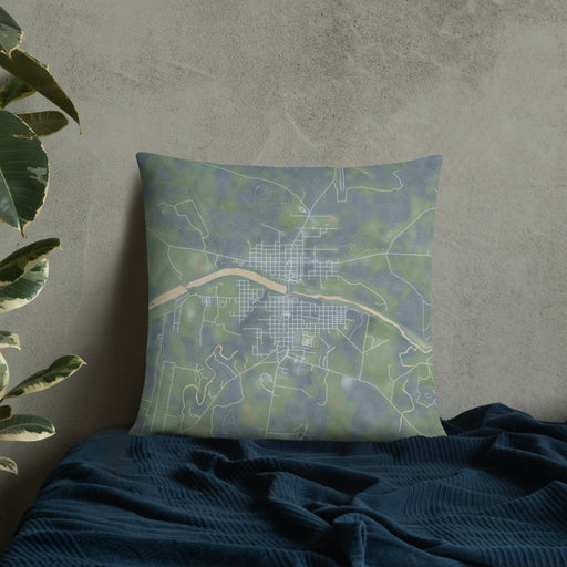 Custom Llano Texas Map Throw Pillow in Afternoon on Bedding Against Wall