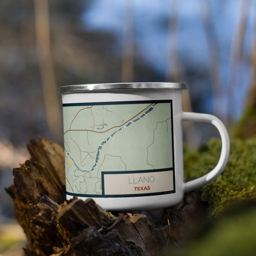 Right View Custom Llano Texas Map Enamel Mug in Woodblock on Grass With Trees in Background