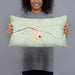 Person holding 20x12 Custom Llano Texas Map Throw Pillow in Woodblock