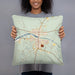 Person holding 18x18 Custom Llano Texas Map Throw Pillow in Woodblock