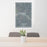 24x36 Logan Ohio Map Print Portrait Orientation in Afternoon Style Behind 2 Chairs Table and Potted Plant