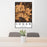 24x36 Logan Ohio Map Print Portrait Orientation in Ember Style Behind 2 Chairs Table and Potted Plant