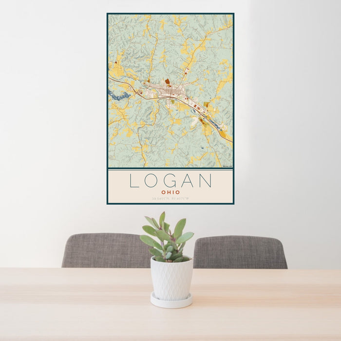 24x36 Logan Ohio Map Print Portrait Orientation in Woodblock Style Behind 2 Chairs Table and Potted Plant