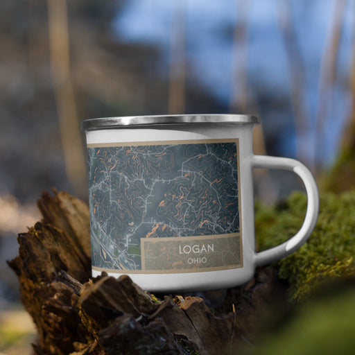 Right View Custom Logan Ohio Map Enamel Mug in Afternoon on Grass With Trees in Background