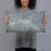 Person holding 20x12 Custom Logan Ohio Map Throw Pillow in Afternoon