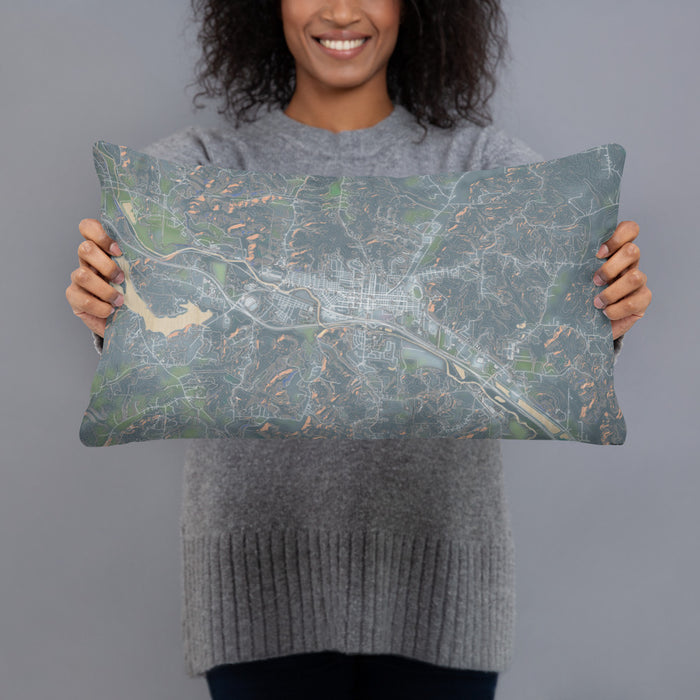 Person holding 20x12 Custom Logan Ohio Map Throw Pillow in Afternoon