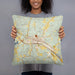 Person holding 18x18 Custom Logan Ohio Map Throw Pillow in Woodblock