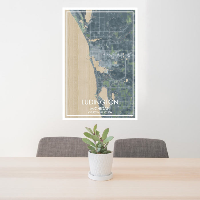 24x36 Ludington Michigan Map Print Portrait Orientation in Afternoon Style Behind 2 Chairs Table and Potted Plant