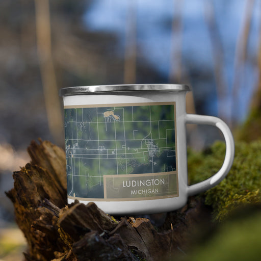 Right View Custom Ludington Michigan Map Enamel Mug in Afternoon on Grass With Trees in Background