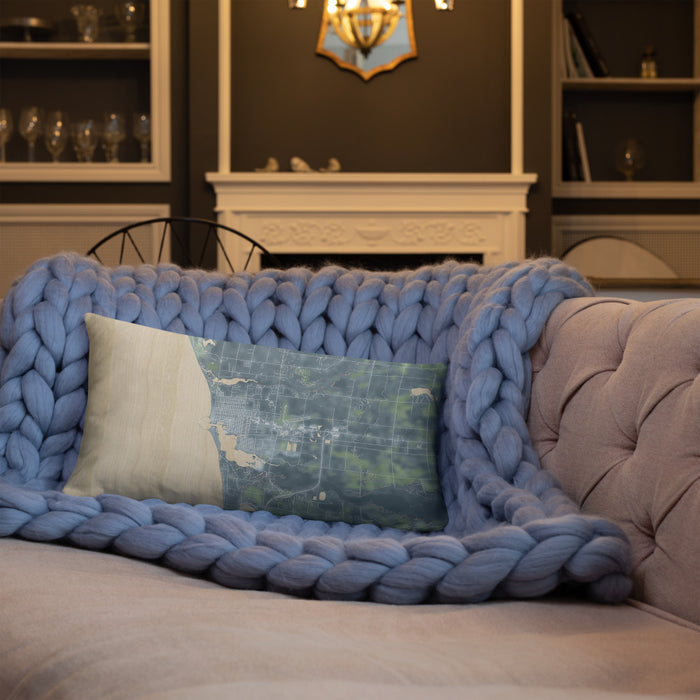 Custom Ludington Michigan Map Throw Pillow in Afternoon on Blue Colored Chair