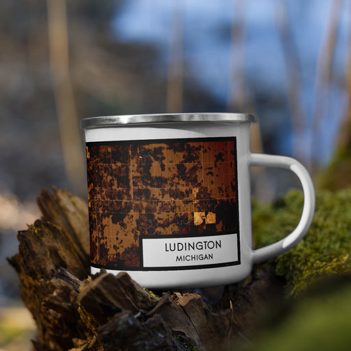 Right View Custom Ludington Michigan Map Enamel Mug in Ember on Grass With Trees in Background