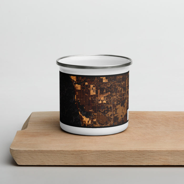 Front View Custom Ludington Michigan Map Enamel Mug in Ember on Cutting Board