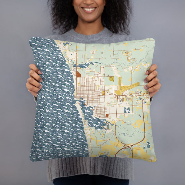 Person holding 18x18 Custom Ludington Michigan Map Throw Pillow in Woodblock