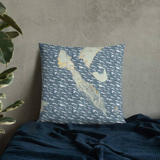 Custom Lummi Island Washington Map Throw Pillow in Woodblock on Bedding Against Wall