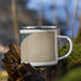 Right View Custom Lutsen Minnesota Map Enamel Mug in Afternoon on Grass With Trees in Background