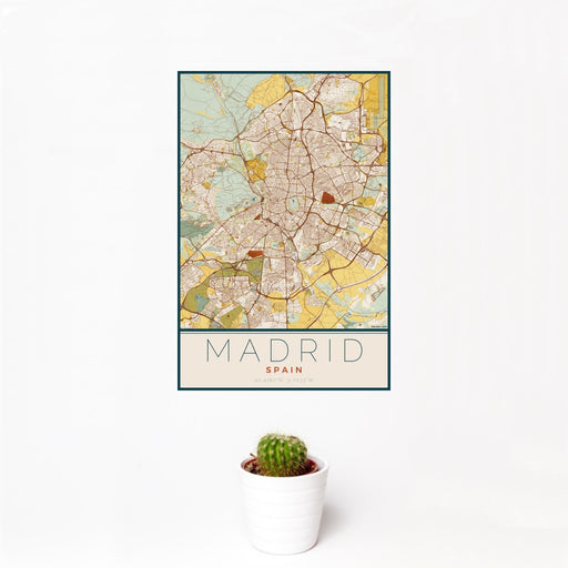 12x18 Madrid Spain Map Print Portrait Orientation in Woodblock Style With Small Cactus Plant in White Planter