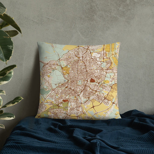 Custom Madrid Spain Map Throw Pillow in Woodblock on Bedding Against Wall