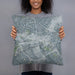 Person holding 18x18 Custom Manassas Virginia Map Throw Pillow in Afternoon